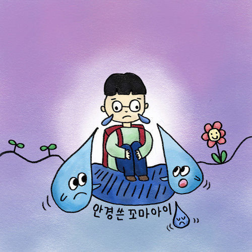 The boy with glasses