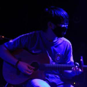 02-我在下雨天听你唱歌