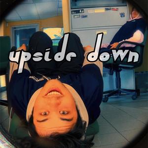 Upside down.