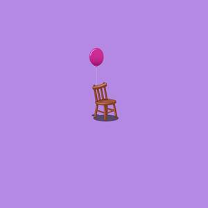 chair with a pink balloon