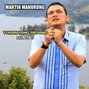 TUHAN YANG PEGANG