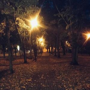 Standing in a dark room