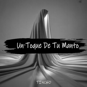 UN TOQUE DE TU MANTO