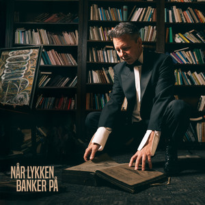 NÅR LYKKEN BANKER PÅ