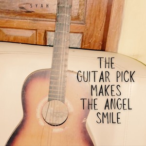THE GUITAR PICK MAKES THE ANGEL SMILE