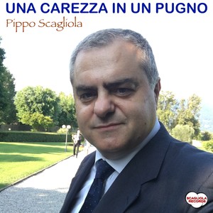 Una carezza in un pugno