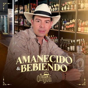 Amanecido Y Bebiendo