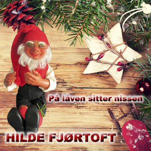 På låven sitter nissen