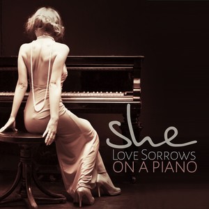 She: Love Sorrows on a Piano