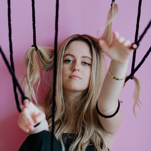 Strings above the Artist