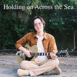 Holding on Across the Sea