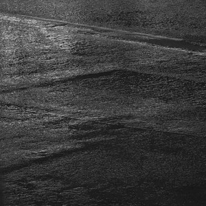 lights reflecting in the rain