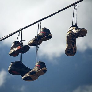 Shoes Hanging from Electrical Wires (Explicit)