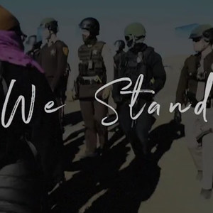 We Stand (feat. Oceti Sakowin Youth Runners)