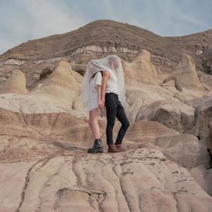 I Think He Wants Her in a White Dress