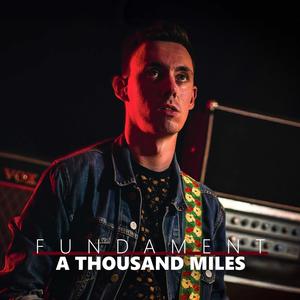 A Thousand Miles (feat. Kevin Langenberg)