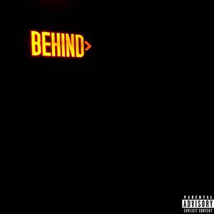 BEHIND