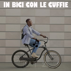 In Bici Con Le Cuffie