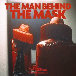 THE MAN BEHIND THE MASK