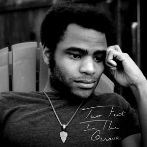 two feet in the grave