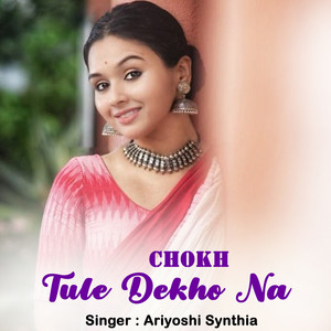 Chokh Tule Dekho Na