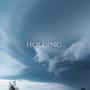 Holding