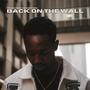 BACK ON THE WALL