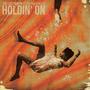 Holdin' On (feat. Dorian Arielle)