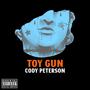 Toy gun (Explicit)