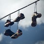 Shoes Hanging from Electrical Wires (Explicit)