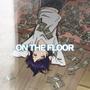 on the floor (Explicit)