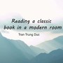 Reading a classic book in a modern room